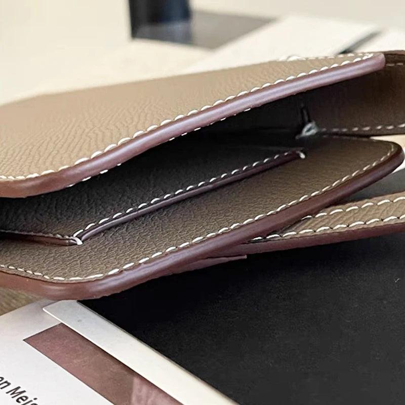 Bolsa de telefone de design de luxo feminina portátil de couro genuíno